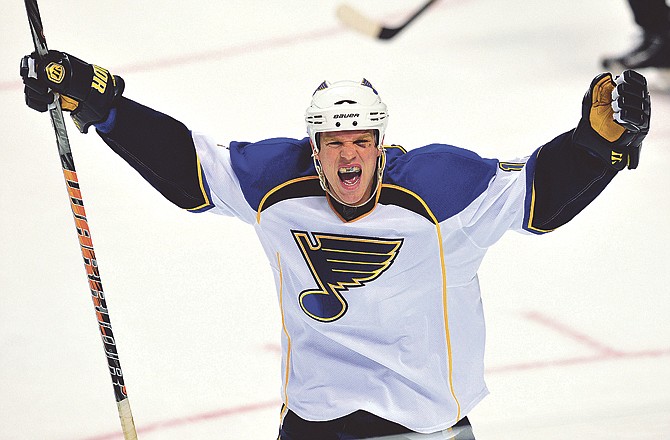St. Louis Blues' Brad Winchester celebrates after teammate Matt D'Agostini scored a third-period goal against the Florida Panthers in an NHL hockey game in Sunrise, Fla., Tuesday, Feb. 8, 2011. St. Louis won 2-1.