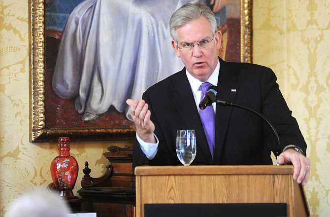 Gov. Jay Nixon speaks to members of the media Thursday at the Governor's Mansion during the Associated Press/Missouri Press Association Day at the Capitol.