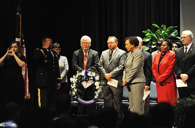 Lt. Col. Patrick Kent and Lincoln University President Carolyn Mahoney laid a wreath in honor of the founders of Lincoln University on Thursday.