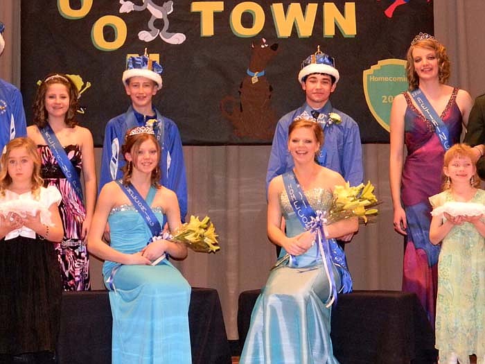 Crowned the 2011 California High School Courtwarming Princess and Queen, from left, are sophomore Cassi Thompson, daughter of Billy Barnett and Grant Thompson, escorted by Ethan Jones, son of Keith and Sarah Jones, and senior Kelci Dampf, daughter of Mark and Jennifer Dampf, escorted by Jacob Allison, son of Greg and Paula Allison. 