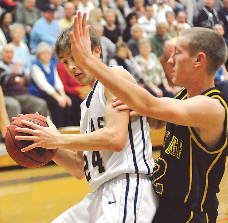 Helias Crusader Deion Hughes against Rock Bridge Friday at Rackers Fieldhouse. 