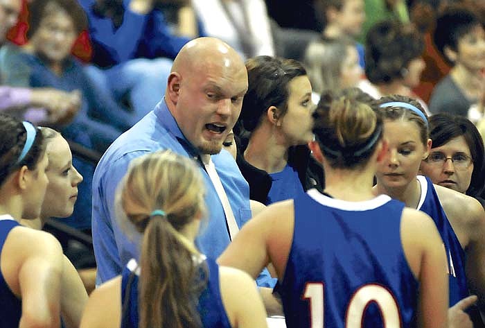 California Coach Bobby Sangster talks to the Lady Pintos during the Tri-County Conference championship game against Blair Oaks Monday, Feb. 21 at Wardsville. The Lady Pintos defeated the Lady Falcons 55-49 to claim the title.