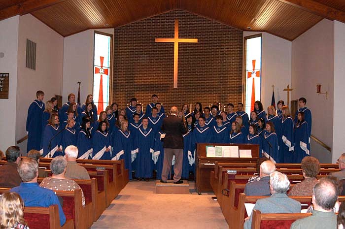 Visiting from Concordia High School, "The Singing Saints" sing "I Will Praise Thee, O Lord," by Knut Nystedt, before an appreciative congregation and visitors at St. Paul's Lutheran, California, and a radio audience.