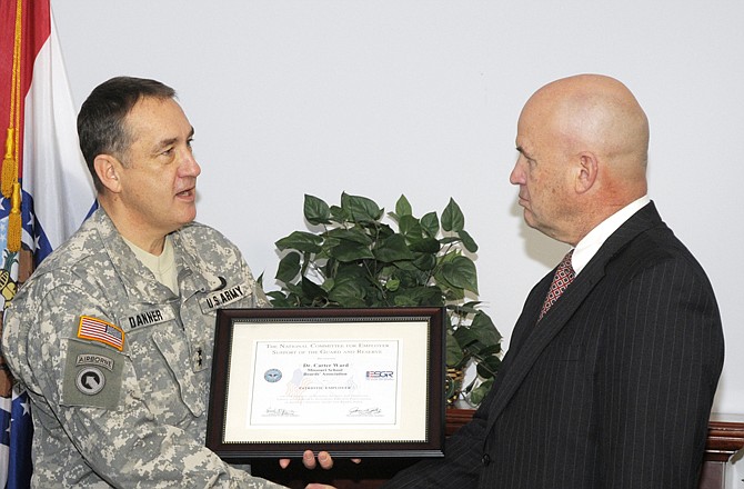 Carter Ward, right, of the Missouri School Boards Association, was honored Friday with the Patriot Award, presented by Brig. Gen. Stephen Danner of the Missouri National Guard. 