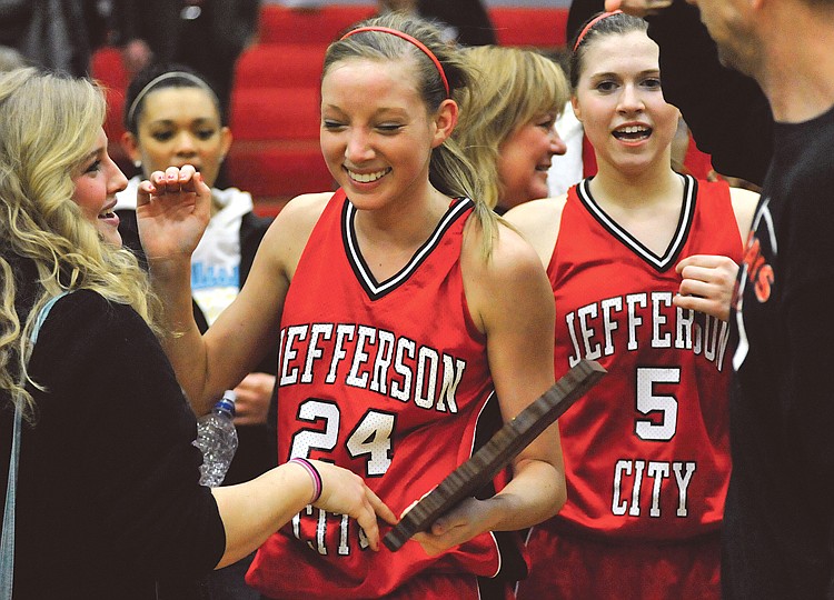 Jefferson City Lady Jays Lauren Coons and Sadie Theroff share their team's victory over top-rated Rock Bridge in the District Finals with fans.