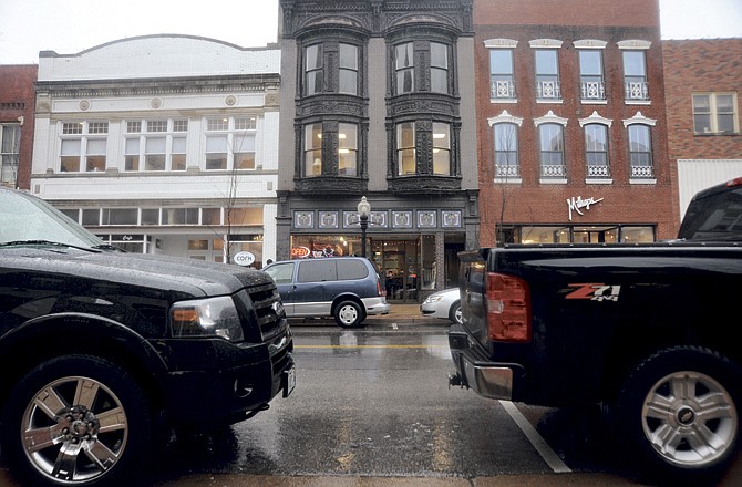 Parked vehicles line both sides of High Street in downtown Jefferson City Thursday afternoon, Feb. 24, 2011. (News Tribune photo)