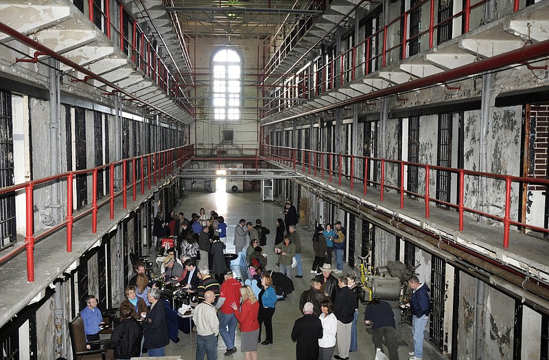 The Jefferson City Convention and Visitors Bureau hosted a ribbon-cutting and prison tour kickoff Tuesday morning, March 1, 2011, at A-Hall on the grounds of the former Missouri State Penitentiary. Visitors milled about the first floor of the building and were able to inspect cells.