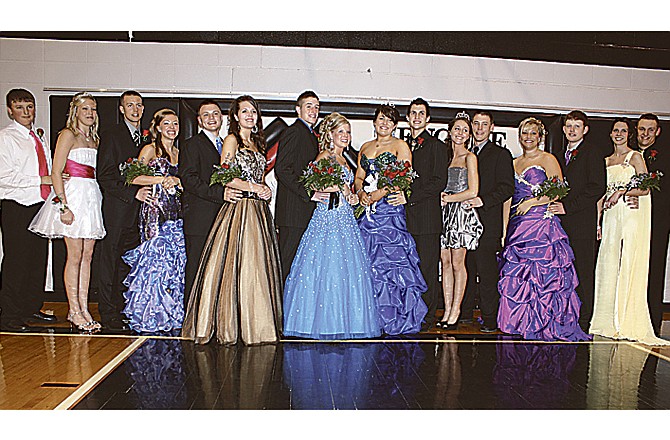 The Cole County R-5 Winter Ball court is: (left to right) Steven Bax, Chelsea Doerhoff, Jacob Wieneman, Kelsey McDonald, Devin Lepper, Ashley Nuttle, Caleb Shaw, Haley Herigon, 2011 queen Shelby Koetting, 2011 king Alex Russell, 2010 queen Blake Cox, 2010 king Damon Adrian, Denise Lepper, Gregory Connell, Angela Schwaller and Derek Doerhoff. 