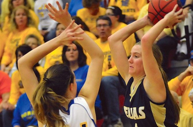 Helias' Alex Heislen looks to pass against St. Francis Borgia on Wednesday at Fleming Fieldhouse.