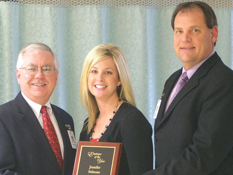 Contributed photo: Callaway Community Hospital CEO Mark Caton (left) and COO/CNO Chuck Baker present Jennifer Salmons with the 2010 Employee of the Year award.
