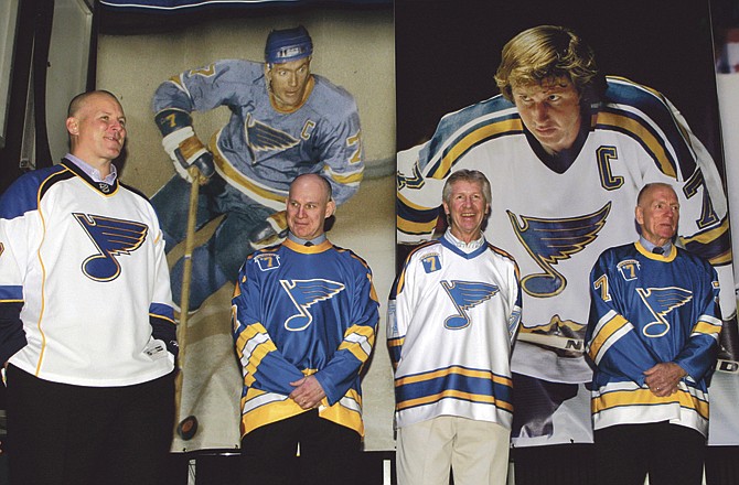 Former Blues players (from left) Keith Tkachuk, Joe Mullen, Garry Unger and Red Berenson are honored at a ceremony for the players who wore No. 7 for the team prior to Monday night's game in St. Louis. 