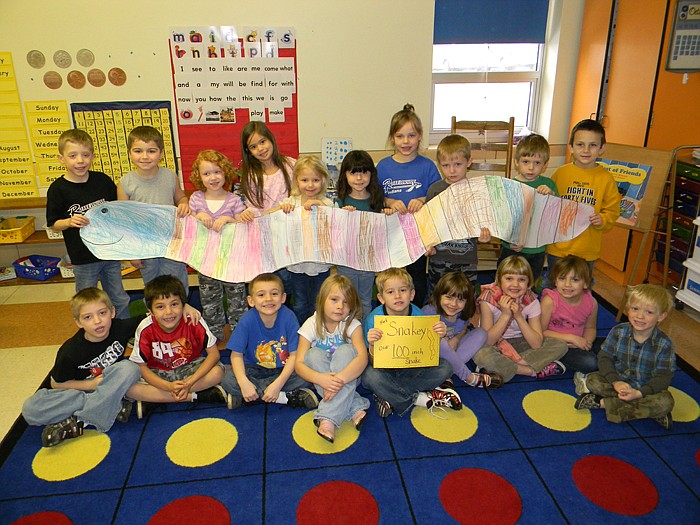 Students in Dana Gerke's kindergarten class with their 100 inch Snake representing the first 100 days of school.