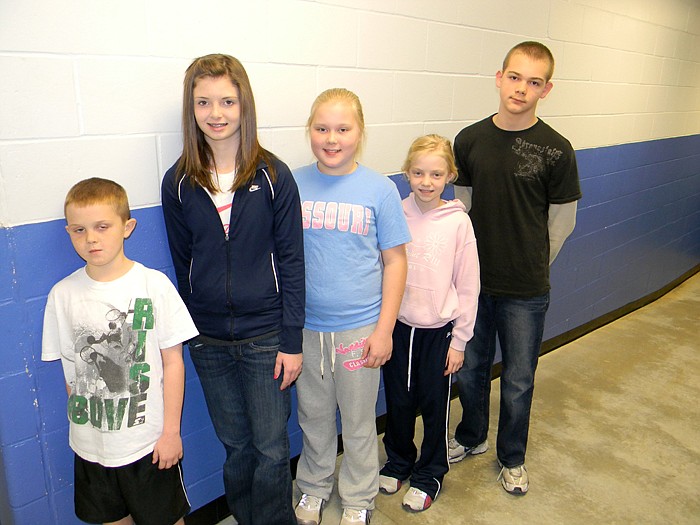 Winners of the High Point Spelling Bee held Feb. 23; from left, are Overal School Winner Trey Porter, Second Place Winner Halie Dampf, Third Place Winner Abby Harris, 5th Grade Winner Molly Dampf and 8th Grade Winner David Wells.