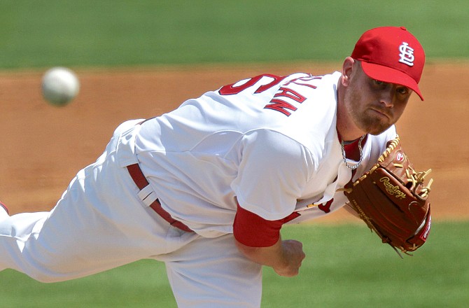 Kyle McClellan of the Cardinals threw five scoreless innings Tuesday in a spring training game against the Braves in Jupiter, Fla.