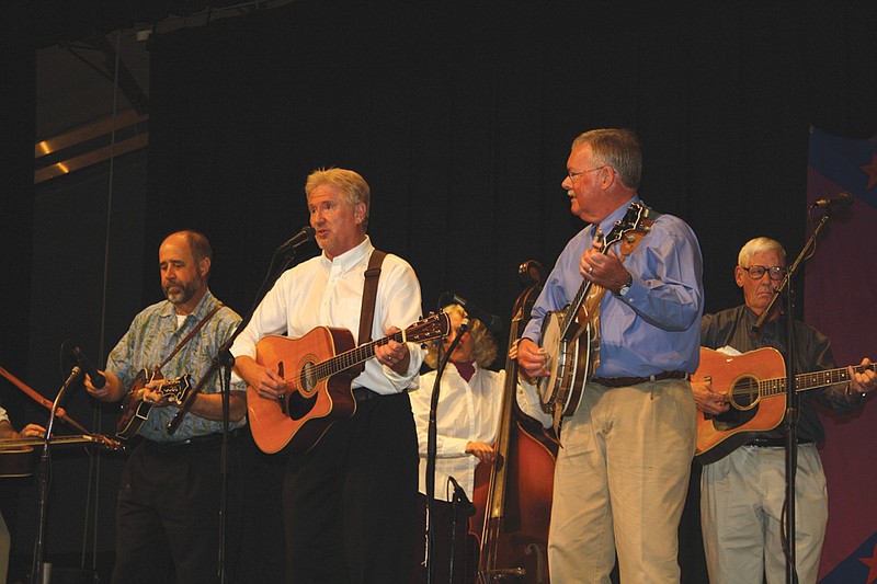 Mandi Steele/FULTON SUN photo: Although not the original members, a group of The Rooster Creek Boys performs at the 106th Kingdom of Callaway Supper Tuesday night. Ron Lutz and The Rooster Creek Boys were presented with the Distinguished Service Award at the event.