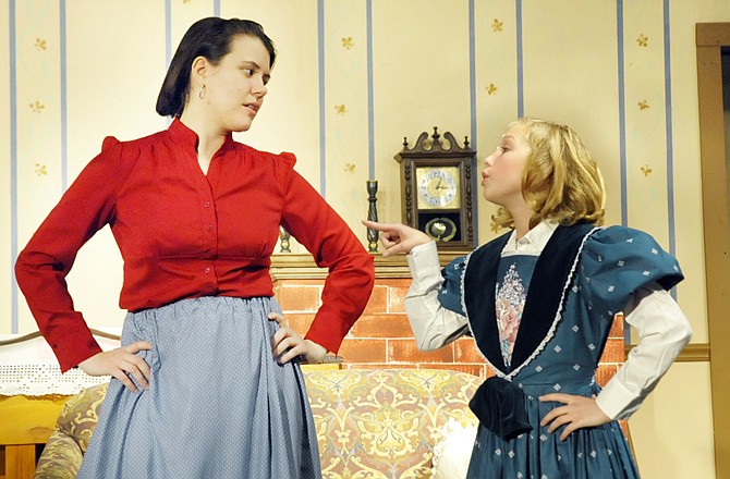 Jo March (Marie Pinkley) talks with her sister, Amy March (Hannah Chaney), in a scene from "Little Women," a Stained Glass Theatre production. 