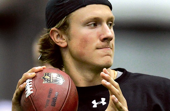 Blaine Gabbert warms up prior to throwing in front of NFL scouts Thursday in Columbia.