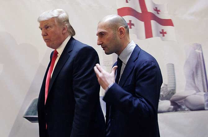 Real estate developer Donald Trump, left, and George Ramishvili, Chairman of Silk Road Group, talk following a news conference in New York, Thursday, March 10, 2011. Trump and the Georgian development group have agreed to build a Trump Tower in Georgia. Trump indicated he is seriously considering a run for the U.S. presidency.