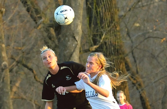 Alex Heislen of Helias battles for the ball during Monday night's game against Lebanon at the 179 Soccer Park.