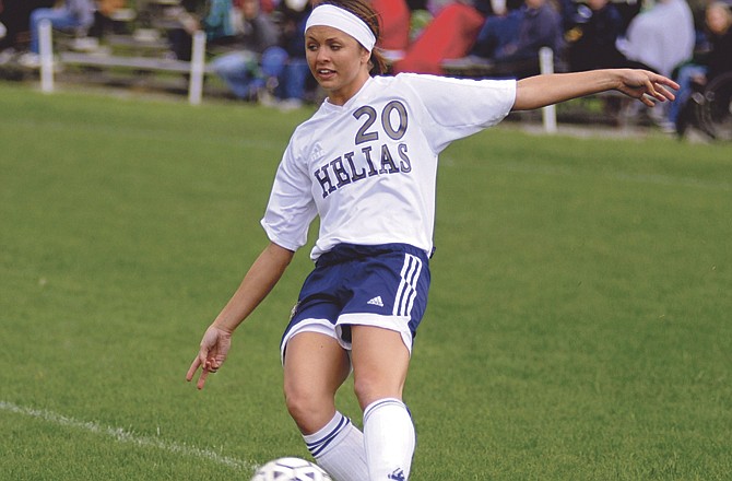 Helias' Maggie Hughes sends the ball upfield during a game last season at the 179 Soccer Park. (File photo)