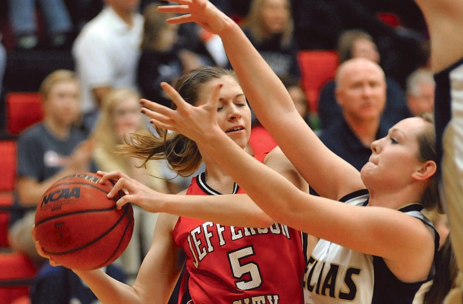 Jefferson City's Sadie Theroff and Helias' Arielle Chambers are among the several area players named to the all-district basketball teams released today.