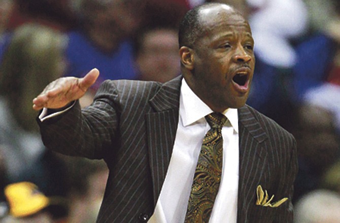 Missouri coach Mike Anderson talks to his players during the first half of an NCAA college basketball game against Texas A&M in the second round of the Big 12 men's tournament in Kansas City, Mo., Thursday, March 10, 2011.
