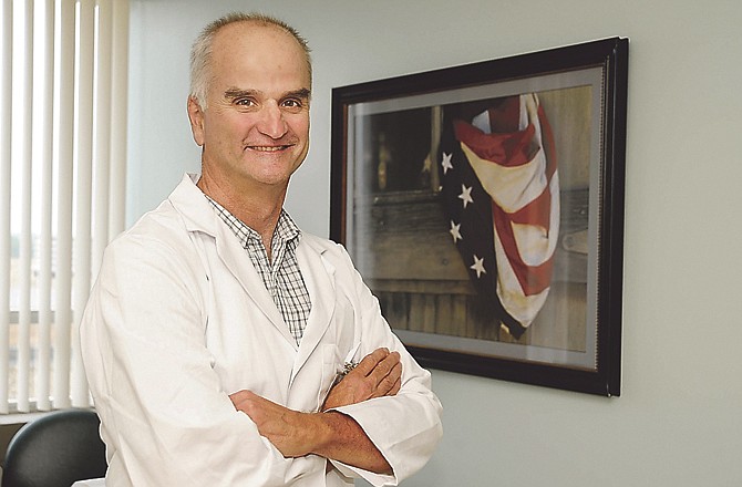 Dr. David Flood, orthopedic surgeon and sports medicine specialist at Capital Region Medical Center, who has recently moved here from San Diego. 