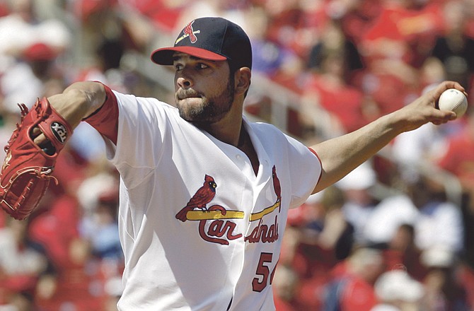 St. Louis Cardinals starting pitcher Jaime Garcia throws during the sixth inning of a baseball game against the San Diego Padres on Sunday, April 3, 2011, in St. Louis. 