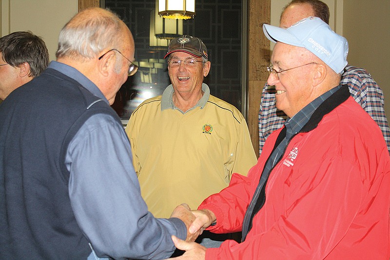 Mandi Steele/FULTON SUN photo: (Left) Robert Craghead congratulates LeRoy Benton for his win Tuesday night at the Callaway County Courthouse after the election results came in. Wayne Chailland (middle) won his bid for Ward 1 Fulton Councilman.