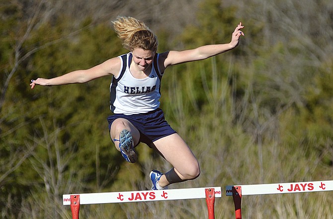 Helias' Danica Schimkus leaves behind the competition while winning the 300-meter hurdles during Tuesday's dual meet with Fulton at Thomas Jefferson Middle School.