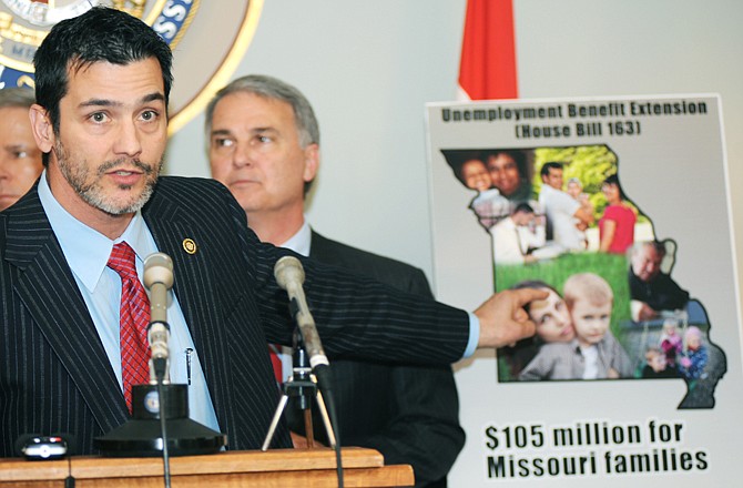 Sen. Brian Nieves, R-Washington, was one of several senators who alled the conference Wednesday to discuss legislation that would extend unemployment benefits in Missouri. 
In the background, from left, are Senators Rob Schaaf and Robert Mayer.