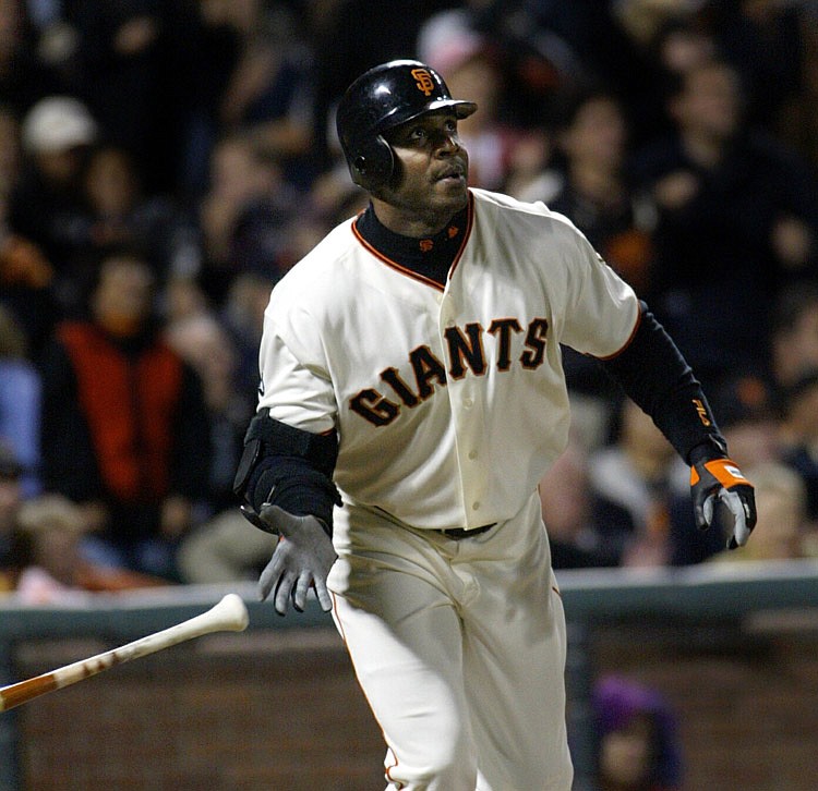 This Sept. 16, 2003, file photo shows San Francisco Giants' Barry Bonds watching the flight of his 656th career home run off San Diego Padres pitcher Adam Eaton, in the fifth inning, in San Francisco. More than three years after Barry Bonds was first indicted, his federal trial is finally nearing its end. The record-setting baseball star is charged with three counts of lying to a grand jury in December 2003.