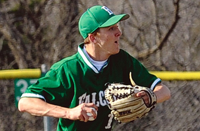 Blair Oaks' Adam Bax prepares to throw to first to complete a double play against Blue Springs during Friday's game at the American Legion Post 5 Sports Complex.