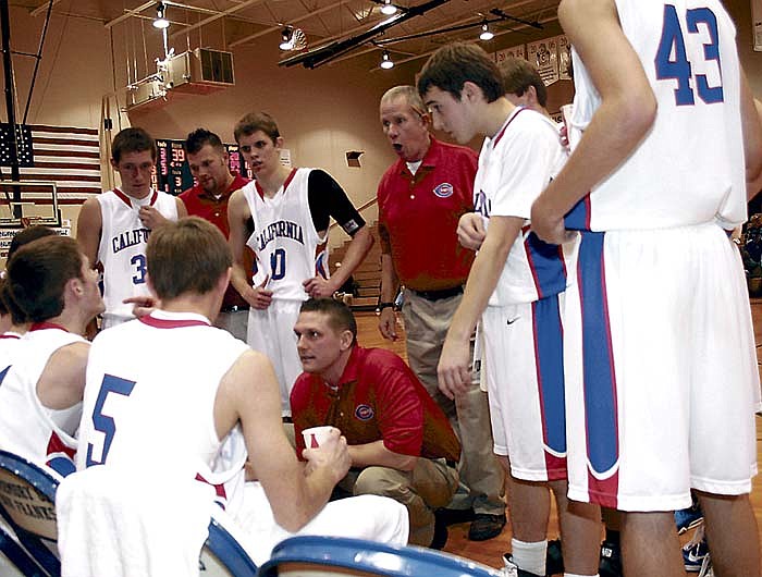 California High School Head Boys Basketball Coach Jeff Taggart, kneeling with the Pintos at a 2011 varsity game, said, "It's amazing to see how these kids progressed from elementary to the varsity level. It meant a lot to see this progression over the seven years I was here at California."