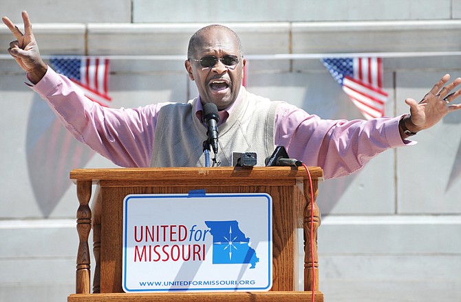 Herman Cain was the featured speaker at a tax rally on the Capitol's south side Tuesday.