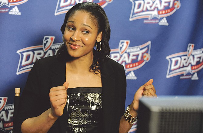 Connecticut's Maya Moore talks with fans in Minnesota via the Internet after being chosen by the Minnesota Lynx with the No. 1 pick in the WNBA basketball draft in Bristol, Conn., Monday, April 11, 2011. 