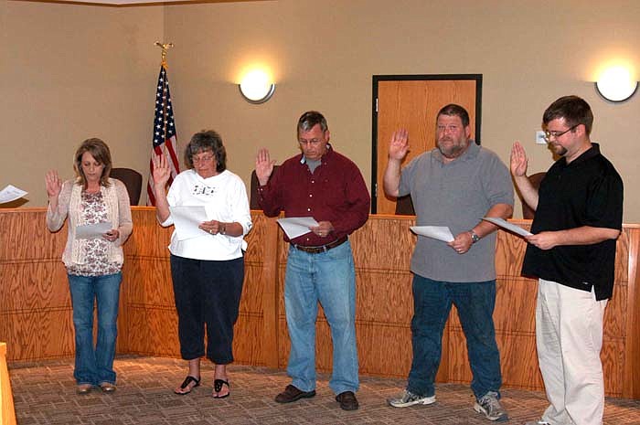 Officers of the City of California elected on April 5 are sworn in at a special City Council meeting Monday, April 11. From left are: City Collector Leslie Gerhart, Ward III Alderwoman Carol Rackers, Mayor Norris Gerhart, Ward I Alderman Tony Wineland and Ward II Alderman Cameron Freiner. 