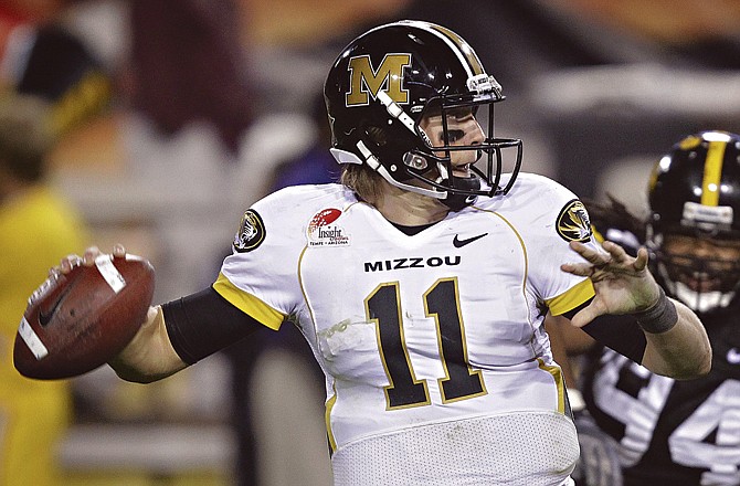 The Missouri Tigers have been working all spring to figure out who will replace Blaine Gabbert (11) at quarterback in the fall.