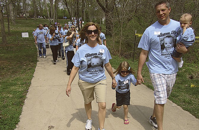 This year's March for Babies ambassador family, the Brandts, leads the March of Dimes fundraiser walk Sunday at Memorial Park. Pictured from left are Joyce, Avery, Danny and Ty. 

