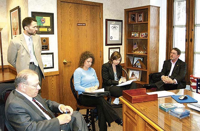 Rep. David Day, R-Dixon, far right, discusses establishing a state veterans' court model during a recent meeting held in his Capitol office. The meeting was attended by local veterans, Office of State Courts, Harry S Truman Memorial Hospital and the Silver Star Families of America. 