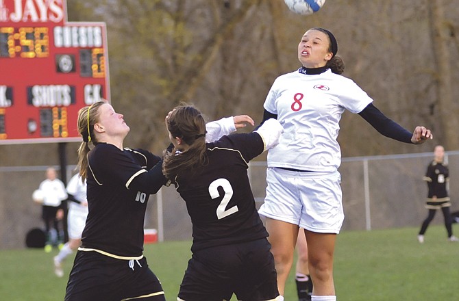 Ashley Clark of Jefferson City goes up for a header during a game against Lebanon earlier this season. The Lady Crusaders and Lady Jays will meet at 6 p.m. today in the Capital City Invitational. 