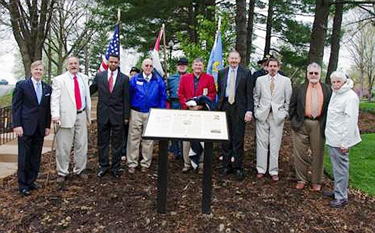 Attending a dedication ceremony Saturday of a Civil War Gray Ghost Trail marker on northwest corner of the intersection of Route F and Westminster Avenue on the Westminster College campus in Fulton are, from left, Westminster President Barney Forsythe; Martin Northway, chairman of the Kingdom of Callaway Civil War Heritage; Major General Byron S. Bagby, keynote speaker and former Fulton resident; Fulton Mayor LeRoy Benton; Joe D. Holt, event speaker with the Kingdom of Callaway Civil War Heritage; Bruce Harris, donor for the historic marker from Callaway Bank; Greg Wolk, president of Missouri's Civil War Heritage Foundation Inc.; Colonel Noel A Crowson, pastor of the High Point Community Chapel; and Dr. Bill Parrish, keynote speaker and Westminster College former professor of history.