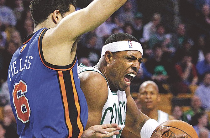 Celtics forward Paul Pierce (34) drives against Knicks guard Landry Fields during the first quarter of Tuesday's game in Boston. 