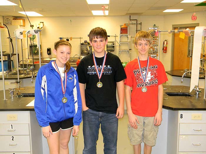 Jamestown students Robyn Eschenbrenner, Andrew Hardwick and Austin Rasmussen received Best of Show medals at the Higbee CCAA Conference Science Fair.