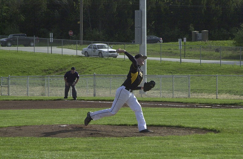 Ryan Boland/FULTON SUN photo: Fulton junior starter Jake Nickelson delivers a pitch in the first inning against Moberly on Tuesday at the high school field. Nickelson didn't allow a hit until surrendering a one-out single in the fifth, en route to an 11-1 NCMC victory over the Spartans. 