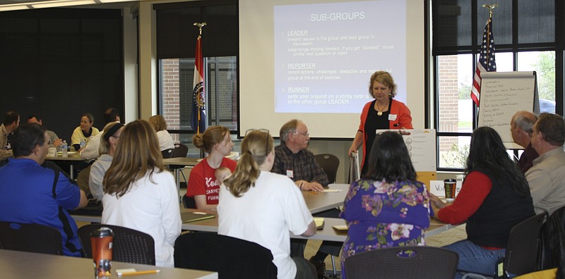 Don Norfleet/FULTON SUN photo: Lisa Binkley, mass care coordinator for Region F Homeland Security Oversight Committee, conducts a emergency planning meeting in Fulton Tuesday of local government agencies and volunteer groups on how to coordinate emergency services during a natural disaster such as a tornado, flood or earthquake.