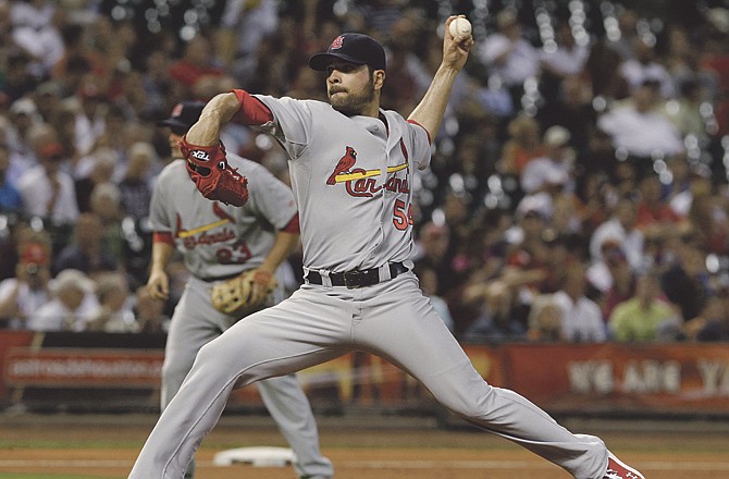 Jaime Garcia of the Cardinals delivers a pitch during Tuesday night's game with the Astros in Houston. 