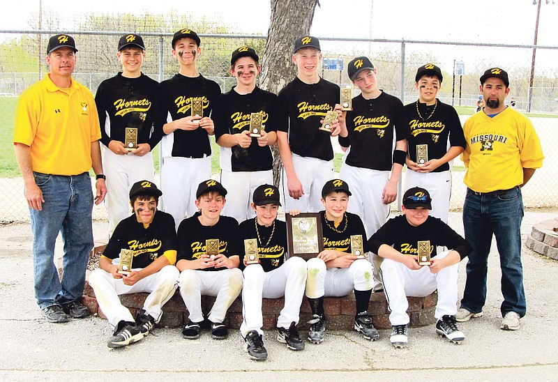 Contributed photo: The Mid-Missouri Hornets 13-and-under baseball team won the Cowhide Classic Tournament from April 14-17 at Twin Oaks Sports Complex in Columbia. Team members are (left to right): front row - Frankie Falotico, Austin Herigon, Wyatt McDowell, Avery Jennings and Luke Knipp, and back row - coach Neal Steffens, Trevor Crisp, Kalin Mitchell, Jake Hammerstone, Chance Cumpton, Ethan Hickey, Tristan Steffens and coach Falotico.