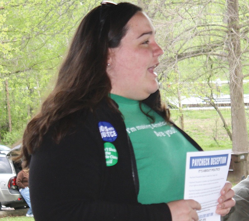 Mandi Steele/FULTON SUN photo: Alexandra Townsend a member of American Federation of State County and Municipal Employees union, speaks out about Senate Bill 202 at a Workers Memorial Day gathering in Veterans Park on Thursday.