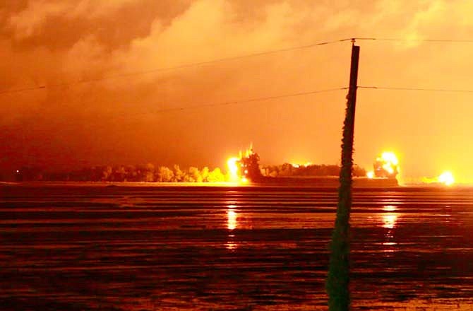 In this image taken from video, an explosion lights up the night sky as the the U.S. Army Corps of Engineers blows an 11,000 foot hole in the Birds Point levee in Mississippi County, Mo. on Monday, May 2, 2011. Army Corps of Engineers' Maj. Gen. Michael Walsh gave the order to blow a two-mile hole into the Birds Point levee in southeast Missouri, which will flood 130,000 acres of farmland in Missouri's Mississippi County but protect nearby Cairo, Ill.  